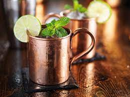 French mule in a copper cup with lime and mint